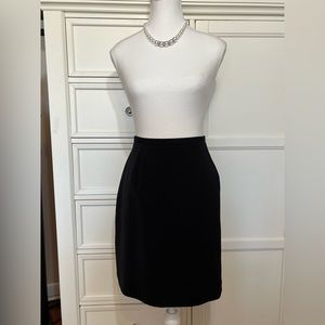 4/$25.   Black pencil skirt Size 12